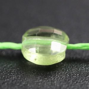 Flad, facetteret peridot 4 x 2,5 mm
