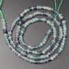 Facet rondeller i regnbue fluorit 2x3mm