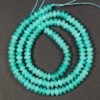 Lyse Turkise rondeller i 'jade' 2,5x5mm