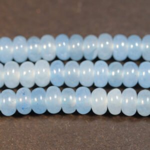 Lyseblå rondeller i 'jade' 2,5x5mm