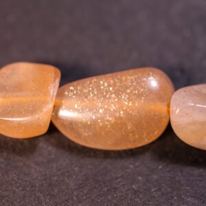 Små Sunstone pebbles
